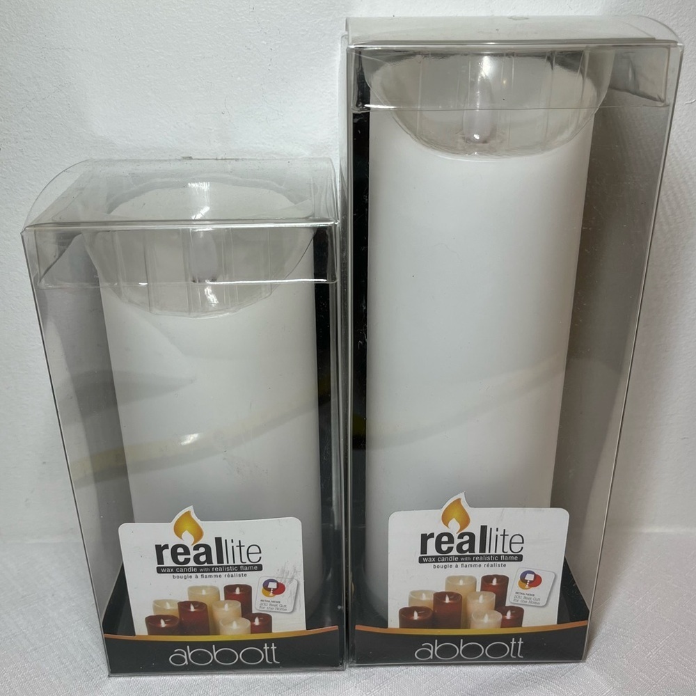 Reallite Flameless Candle Set by Abbott. New. Battery operated.